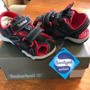 Brand new with box size 5 baby/walker